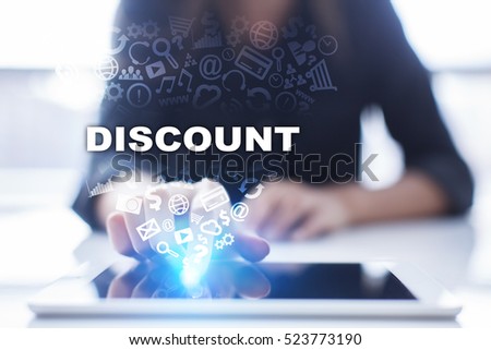 Woman is using tablet pc, pressing on virtual screen and selecting discount.