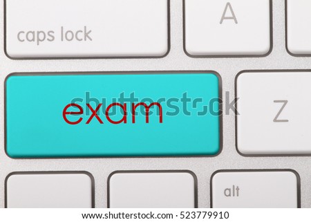 Exam word written on computer keyboard.   