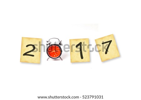  2017 text on grunge paper with old retro clock ,isolated on white background. image for new year 2017 decorative design 
