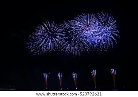 Colorful fireworks light up the sky,New Year celebration.