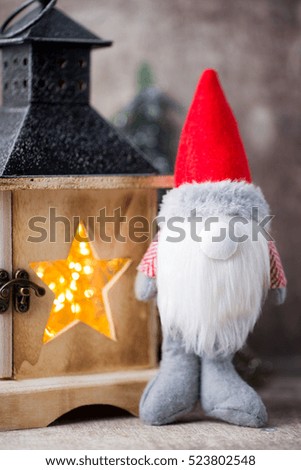Christmas  lantern decor with gnome. Holiday greeting card.