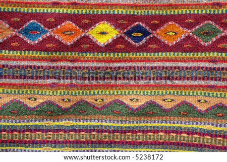 Colorful native american rug - closeup background, texture