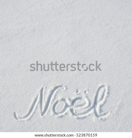 Noel letters handdrawn on flat snow surface. Nice christmas holiday square postcard, greeting card template. Empty space for copy, text, lettering.