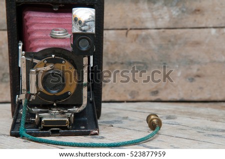 Retro vintage style camera with old fashioned shutter