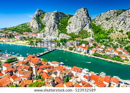 Omis, Croatia. Dalmatia Coast panorama with emerald-green Cetina River, Croatian travel landmark at Adriatic Sea. Royalty-Free Stock Photo #523932589
