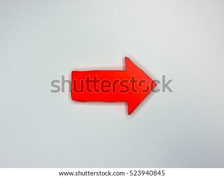 Red Crafted Paper Arrow isolated on white background Pointing right