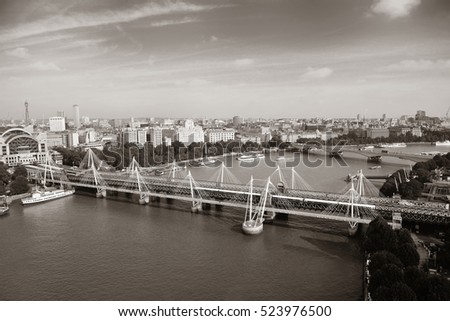 City aerial view from London Eye over Thames River.