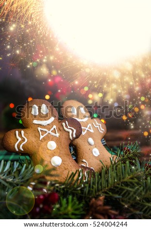 Cute gingerbread men watching with admiration up to salute. Fabulous Christmas mood concept