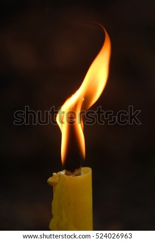 Soft focused of Candles light. Golden light of candle flame