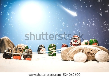 Merry Christmas and Happy New Year beautiful background. Decorated with  Christmas cartoon painting rock : Santa claus, deers, snow man, Christmas trees, gifts, star.