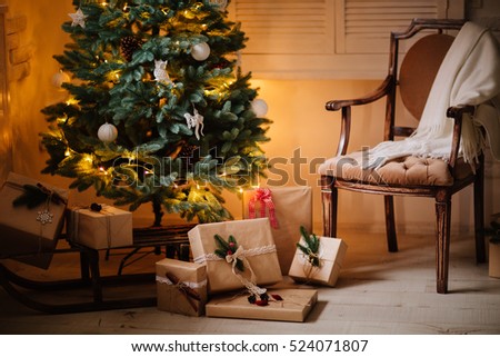 beautiful Christmas gifts under tree in new year decorated house interior