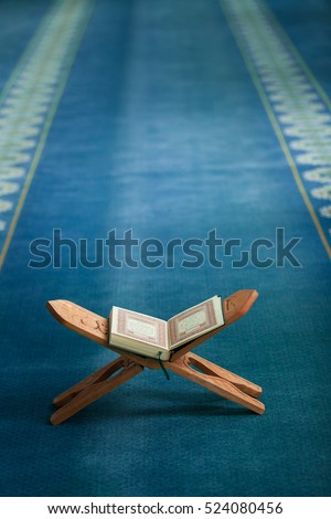 Quran - open for prayers Royalty-Free Stock Photo #524080456