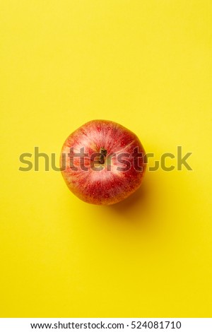 Colorful Food & drink still life concept. Color riot food photography.  Fresh fruits & vegetables on bright color background. Red apple on yellow background.  Closeup. Top view.  Royalty-Free Stock Photo #524081710