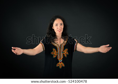 Beautiful woman doing different expressions in different sets of clothes: welcome