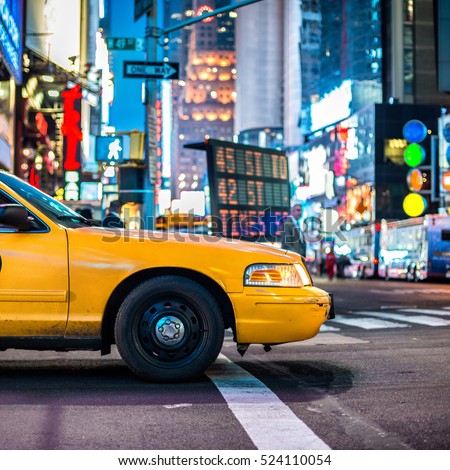 Yellow cabs in Manhattan, NYC. The taxicabs of New York City at night Time Square.
 Royalty-Free Stock Photo #524110054