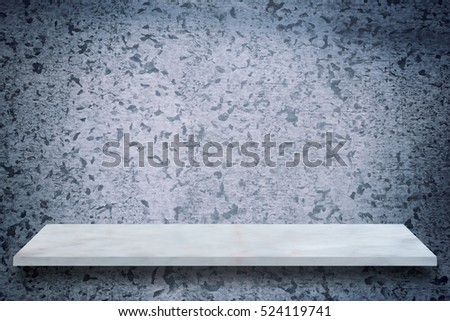 Empty top marble shelves with old zinc plate texture backdrop, Mock up scene for display or montage of product on soft focus blur background. 