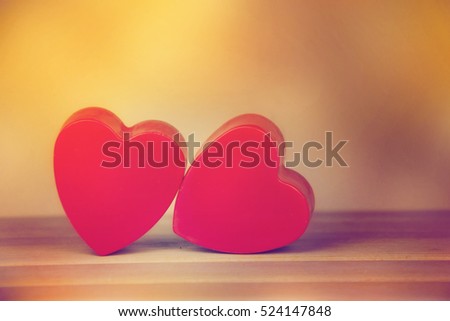 Two lovely hearts on a blue background.Valentines Day background.