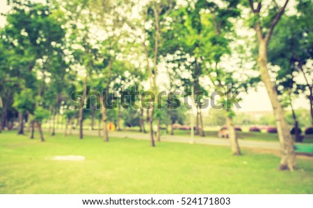 Blurred background,People exercise at green park with bokeh light. Healthy lifestyle concept