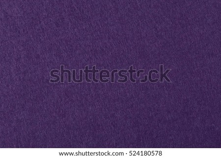 Dark purple felt texture for design, abstract background. High resolution photo.