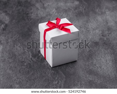 Vintage gift box on wooden background.