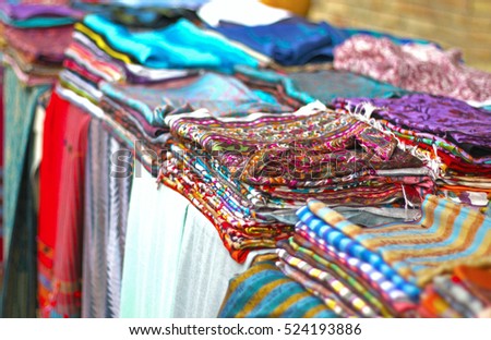 Traditional scarfs on a market in Bukhara, Uzbekistan, Central Asia 