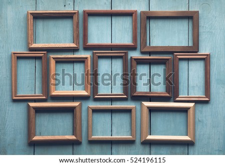 old wooden frames on old blue wall