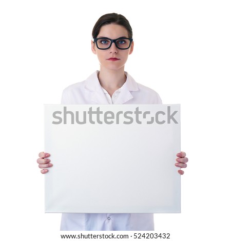 Smiling female doctor assistant scientist in white coat over white isolated background with glasses and white blank board, healthcare, profession, science and medicine concept
