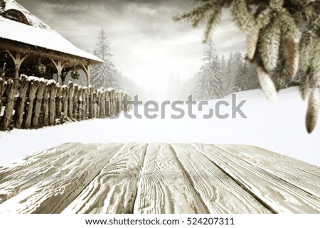 wooden desk of free space and winter landscape 