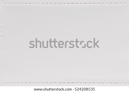 Seam and white leather texture background. Blank material made from animal skin for furniture. Royalty-Free Stock Photo #524208535