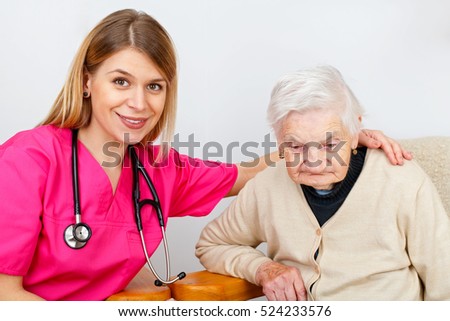 Picture of a senior woman with her caregiver