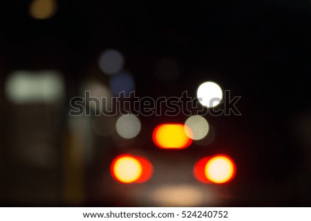 night city street traffic and lights in berlin germany blurred background