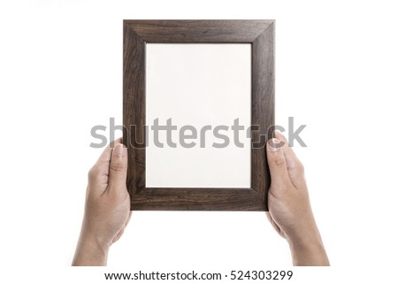 A man(male) hand hold a empty(blank, vacant) wood photo frame isolated white.