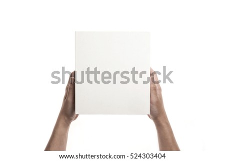 A man(male) hand hold a empty(blank, vacant) white box isolated white.