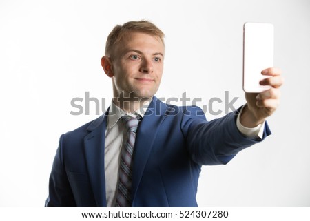 Businessman taking a selfie