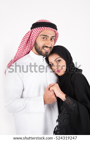 Arab couple standing on white background