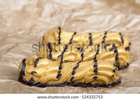 cookies with chocolate on baking paper