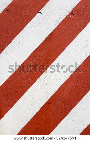 Red and white road marking