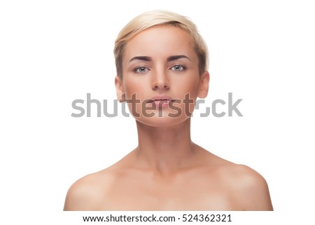 Girl with natural make up and perfect skin on white background in studio photo