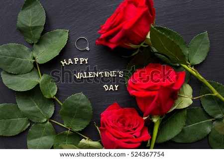 closeup inscription "Happy Valentine on a black background