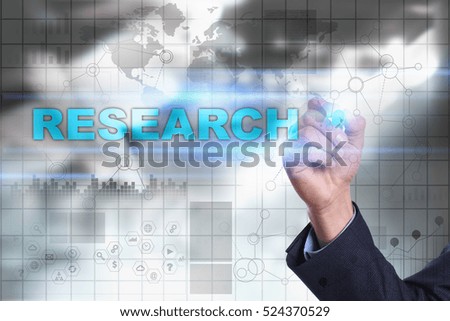 Businessman is drawing on virtual screen. research concept.