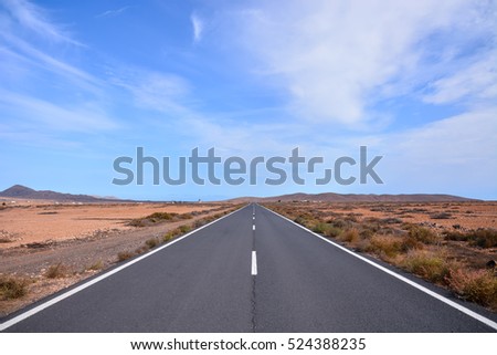 Photo Picture of a road leading off into the desert