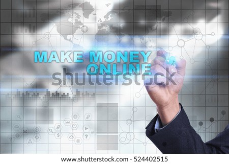 Businessman is drawing on virtual screen. make money online concept.