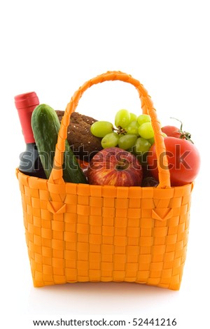 Orange shopping bag with daily food isolated over white