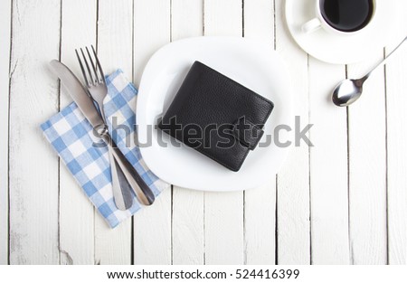 wallet concept food is worth the money Plate Fork Knife vintage wood rustic white background