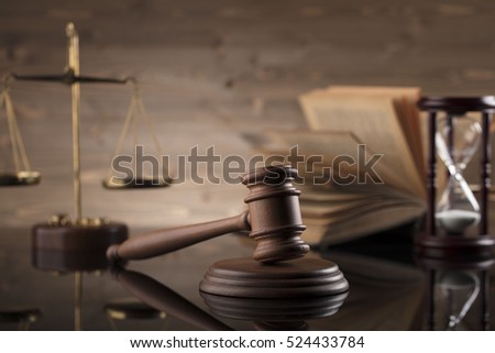 Law and justice concept. Brown wooden background beautiful reflections. Place for typography and logo. 