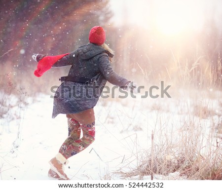 happy girl winter snow runs