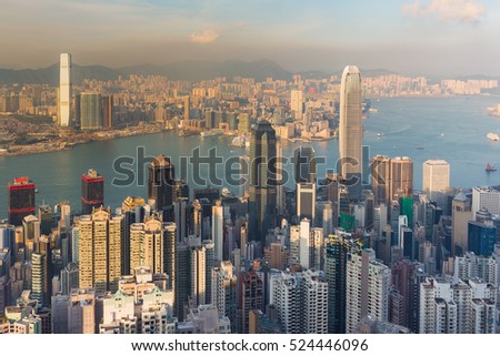 Aerial view, Hong Kong city central business downtown with sunset tone at The Peak point of view