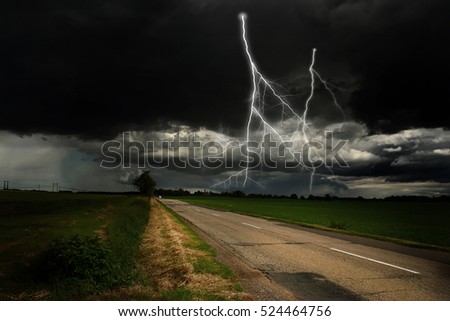 Lightning storm and highway
