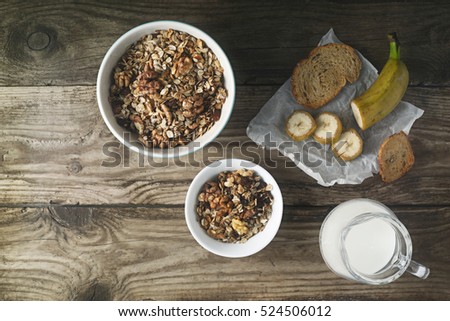Breakfast with granola on the wooden table horizontal