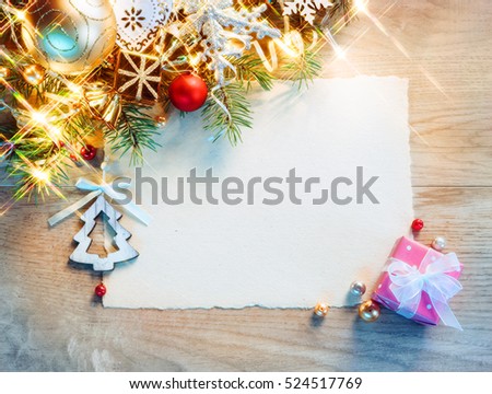 Christmas letter with decorated fir tree on wooden table. Top view. Merry Christmas and Happy New Year!!